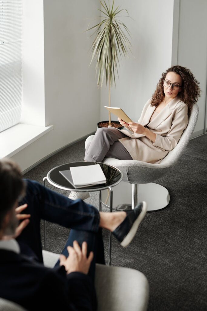 pexels-photo-4343451-4343451 A professional woman conducting a business meeting in a modern office.